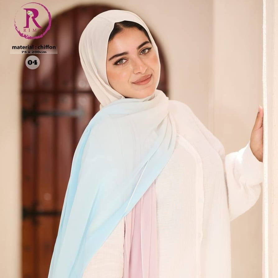 Woman wearing a light-colored scarf with a blurred background