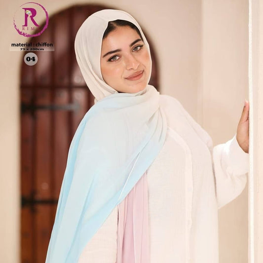 Woman wearing a light-colored scarf with a blurred background